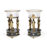 A pair of early 20th century Empire style French gilt and patinated bronze mounted cut glass cent...