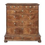 A Queen Anne walnut and featherbanded chest on stand extensively restored