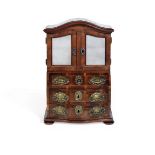 A late 18th/early 19th century German fruitwood verneered and strung miniature bureau cabinet