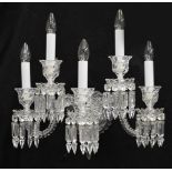 A pair of Baccarat cut and moulded clear glass five light Series 1 wall appliques wall appliques...