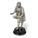 A 19th century and later silvered spelter figure of a moor