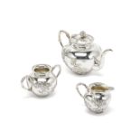 A Chinese silver three-piece tea service Wang Hing, circa 1900