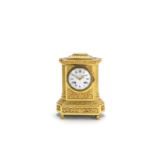 A late 19th century French gilt bronze mantel clock the dial signed for Charles Frodsham & Co, L...