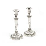A large pair of George III silver candlesticks John Green, Roberts, Mosley & Co, Sheffield 1803 (2)