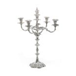 A Victorian five-light silver candelabrum the column: George Adams, London 1872; the branch secti...