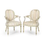 A pair of George III painted and parcel gilt armchairs (2)