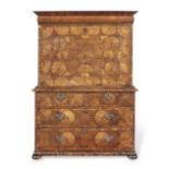 A William and Mary kingwood or 'princeswood', rosewood and oyster veneered escritoire in the mann...