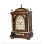 A late 19th century gilt brass mounted mahogany chiming mantel clock and bracket the movement num...