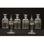 A pair of cut and moulded clear glass twin light lustre candelabra (2)