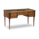 A 19th century French mahogany and brass mounted writing table