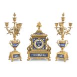 A 19th century ormolu and porcelain mounted French clock garniture 3