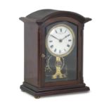 An early 20th century mahogany electric mantel clock The dial inscribed Eureka Clock Co. Ltd, Lon...