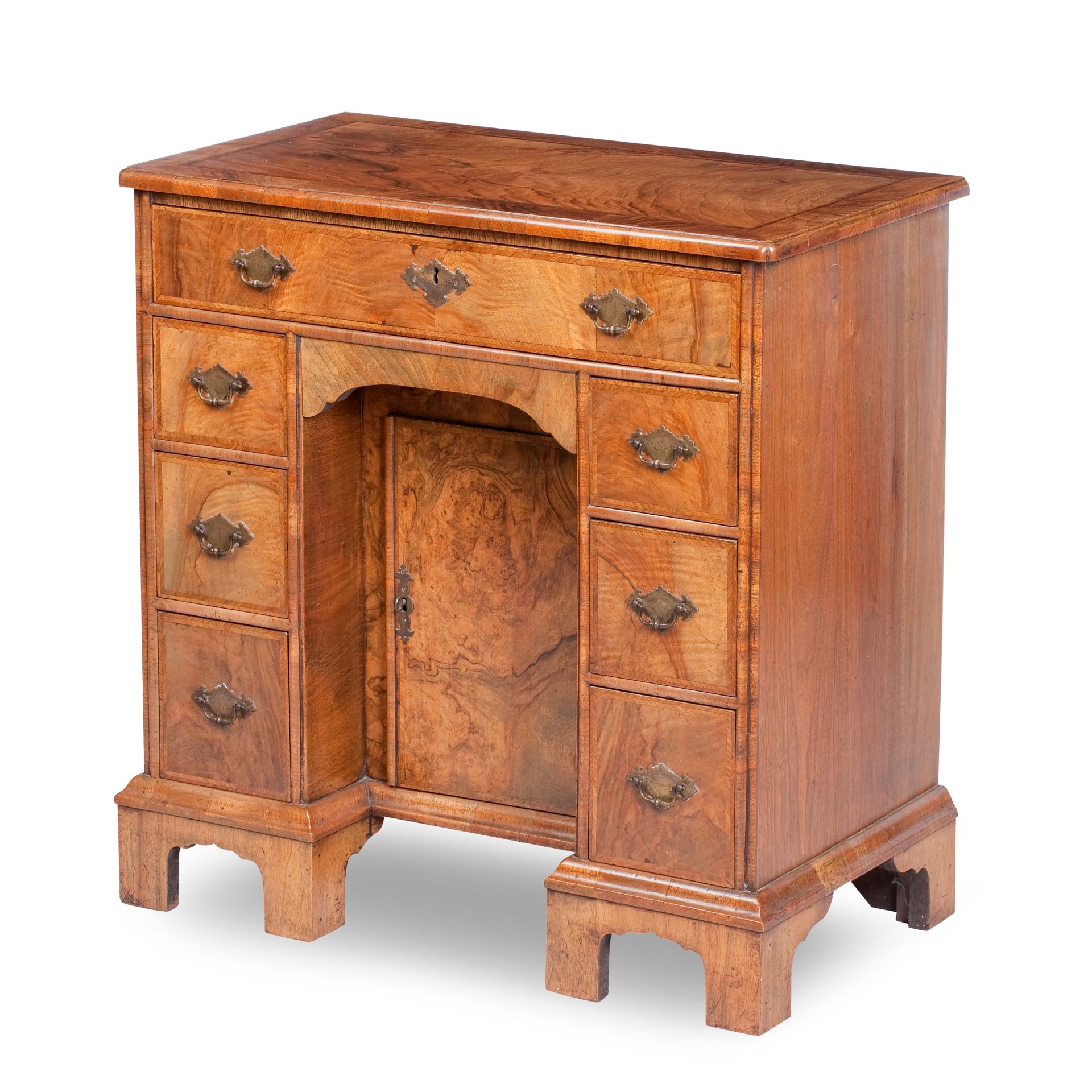 A George II style Mahogany featherbanded kneehole desk, mid 20th century