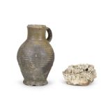 A Rhineland stoneware jug together with an encrusted stoneware shard 15th Century