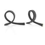A pair of contemporary wrought iron bookends (2)
