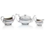 A George III three piece Scottish silver tea service by John Mckay, Edinburgh 1814