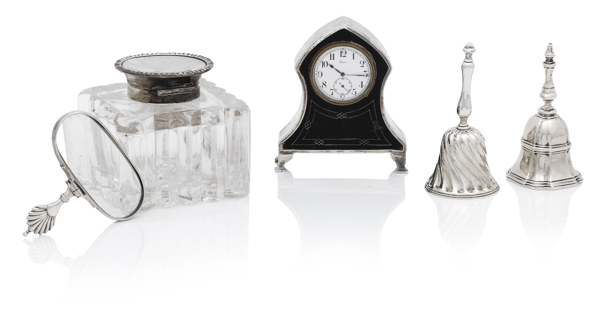 An early 20th century silver-mounted glass inkwell and two silver table bells Birmingham 1910, th...