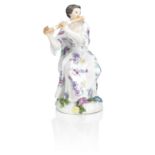 A Meissen figure of a lady playing the flute 18th century