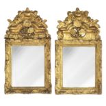 A pair of Louis XV giltwood and gesso wall mirrors