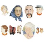 A collection of wall masks including a Lenci wall mask attributed to Elena König Scavini Circa ...