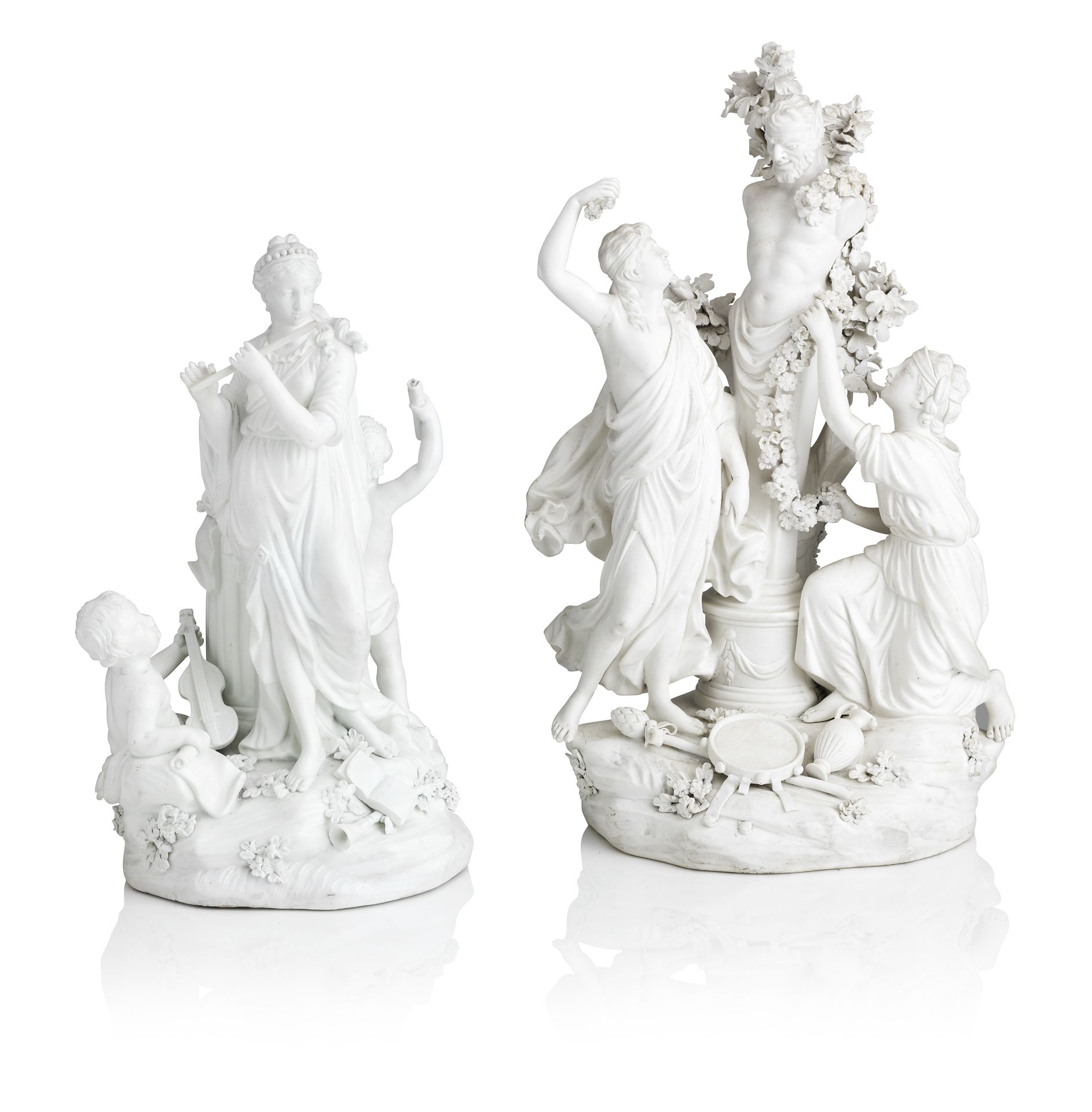 A Derby biscuit group of Two Bacchantes adorning a bust of Pan, and a Derby biscuit group of Musi...