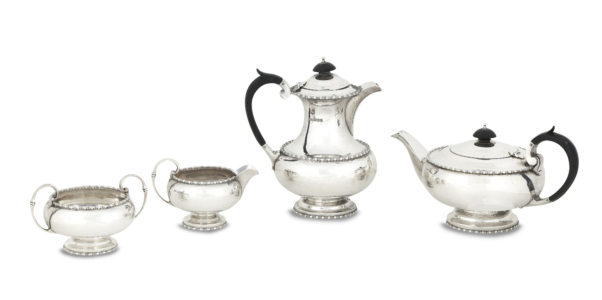 A four piece 20th century silver tea service by Walker & Hall, Sheffield 1932