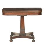 A 19th century mahogany card table