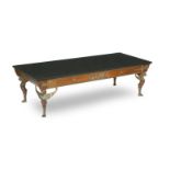 A mahogany Empire Revival style granite top coffee table, 20th Century