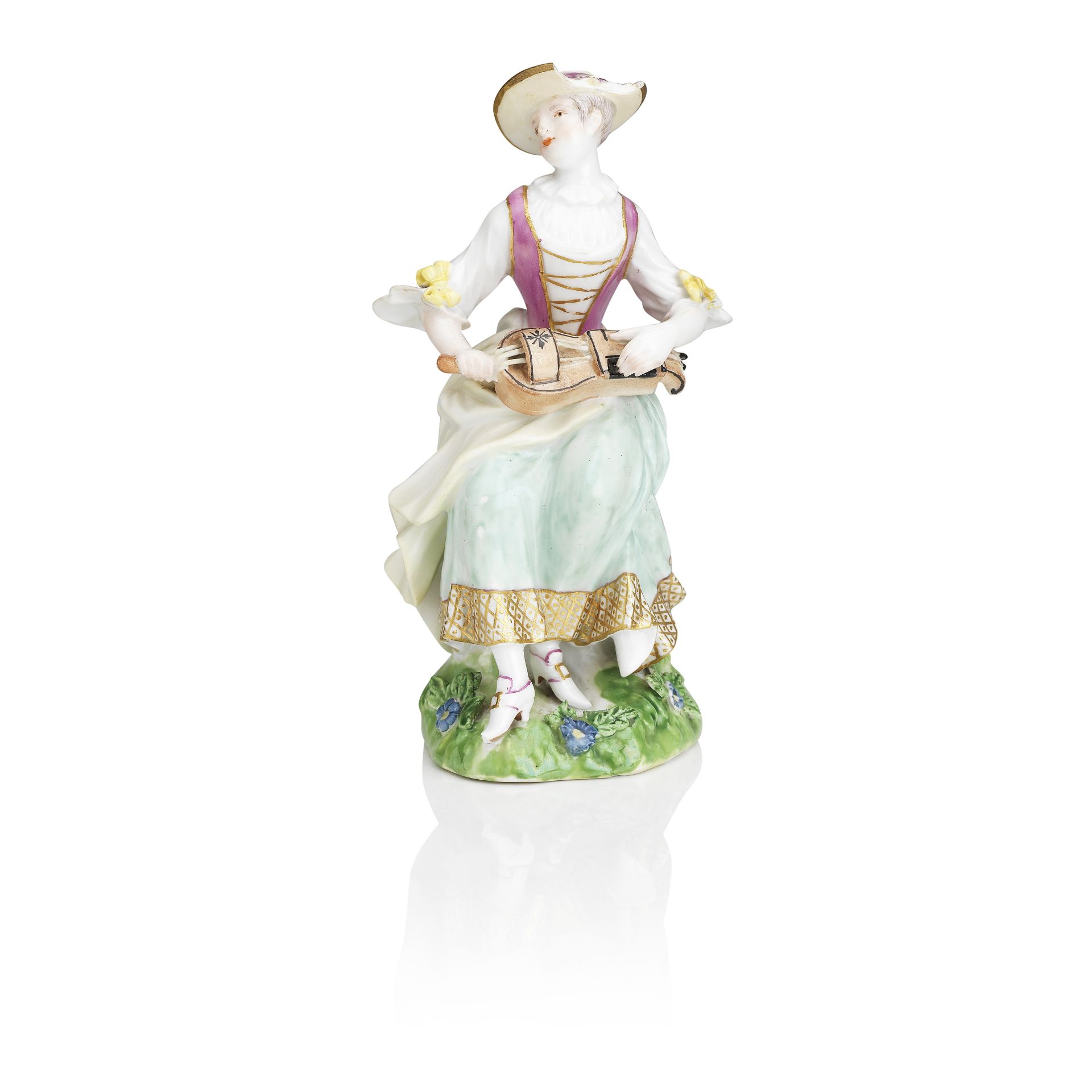 A Meissen figure of a lady playing the hurdy-gurdy 18th century