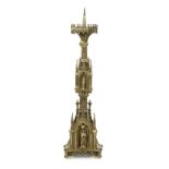 A 19th century Gothic Revival brass pricket candlestick, in the manner of A.W.N. Pugin