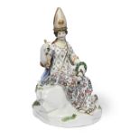 An Academic Meissen figure of a seated lady wearing a mitre hat Circa 1770
