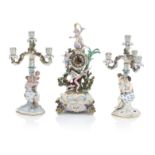 A Meissen clock on stand and two candelabra Late 19th century