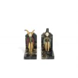 Roland Paris (German, 1894-1945) 'Wisdom and Poetry': A Pair of Art Deco Bronze and Ivory Bookend...