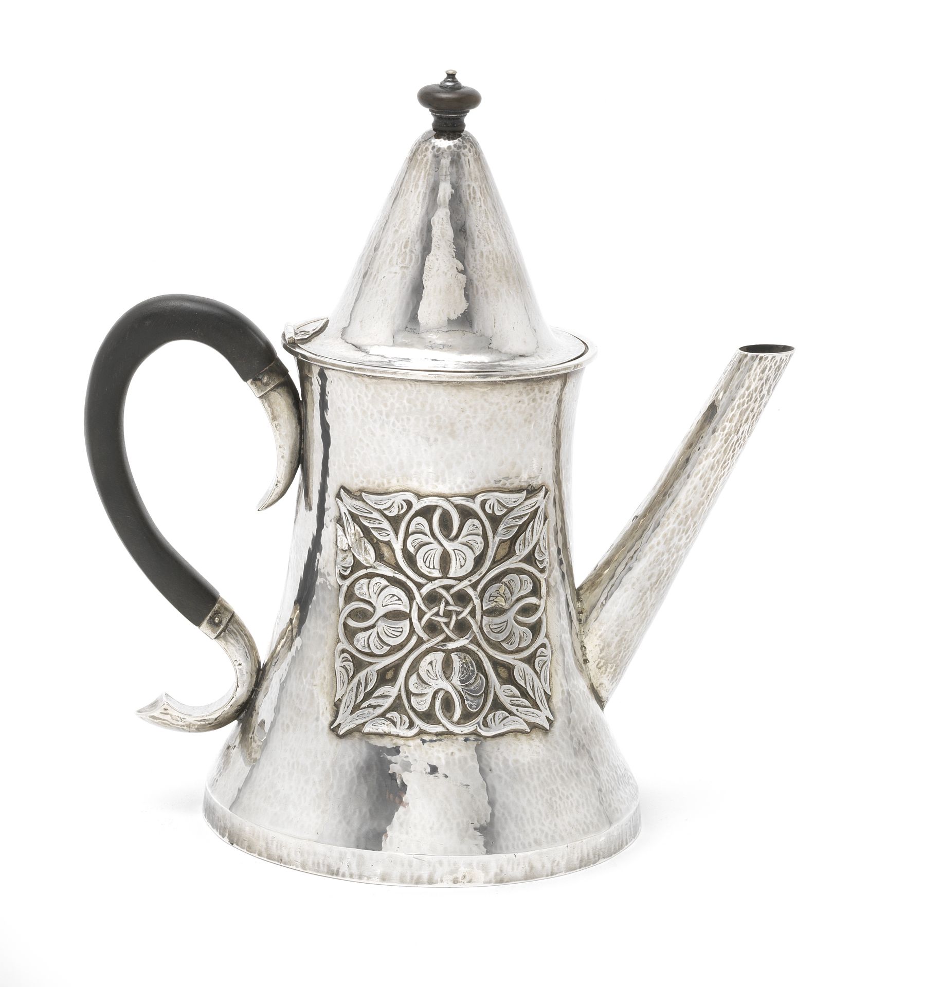 An Edwardian Arts and Crafts silver coffee pot by Sibyl Dunlop, London 1904