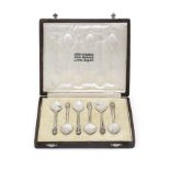 OMAR RAMSDEN: a cased set of six silver coffee spoons London 1938, one spoon unmarked