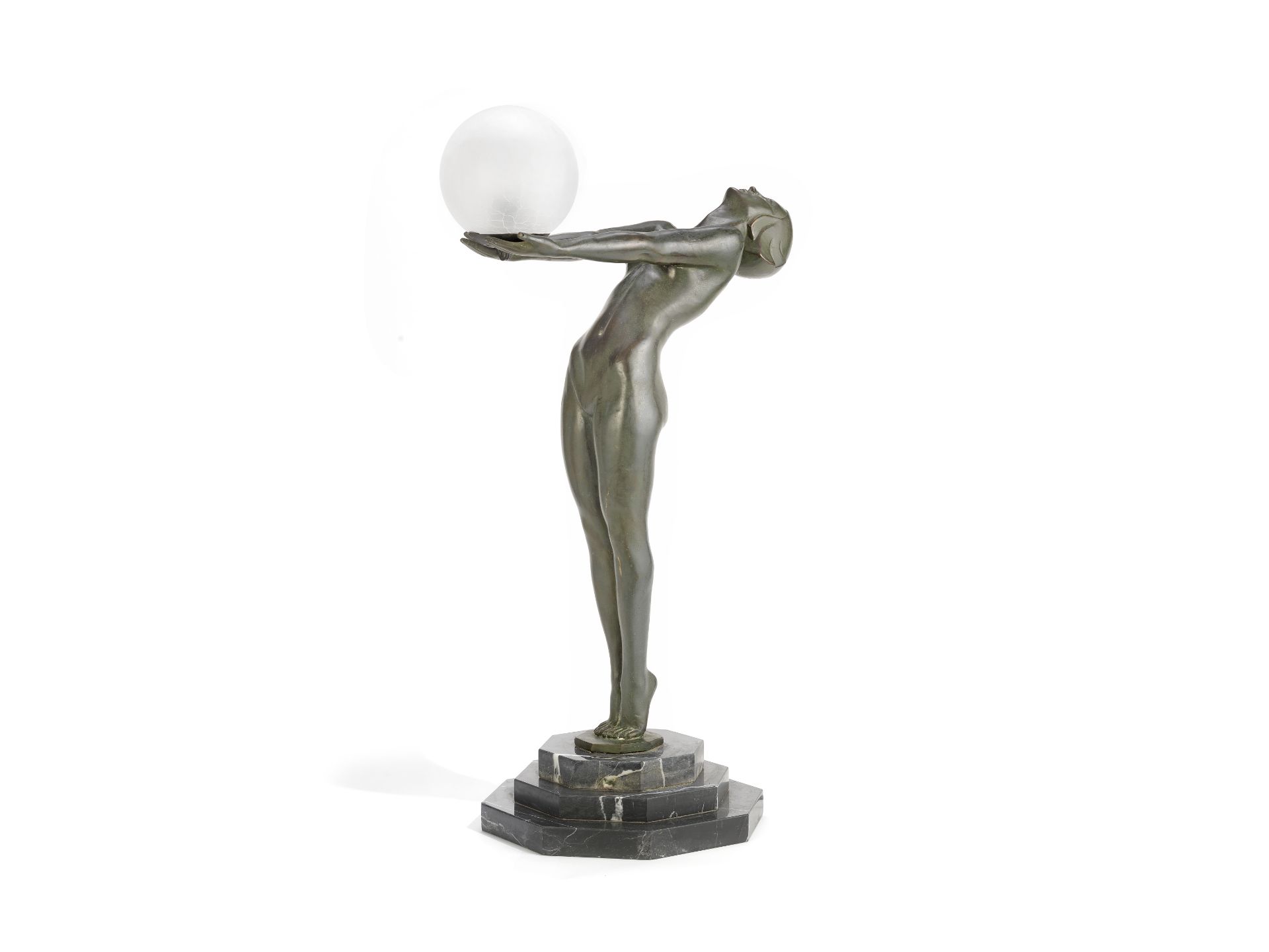 Max le Verrier (French, 1891-1973) Clarté: A Large Art Deco Green Patinated Metal Figural Lamp; m...