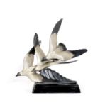 Alexandre Kelety (Hungarian, 1874–1940) 'In Flight': An Art Deco Patinated and Parcel Silver Bron...
