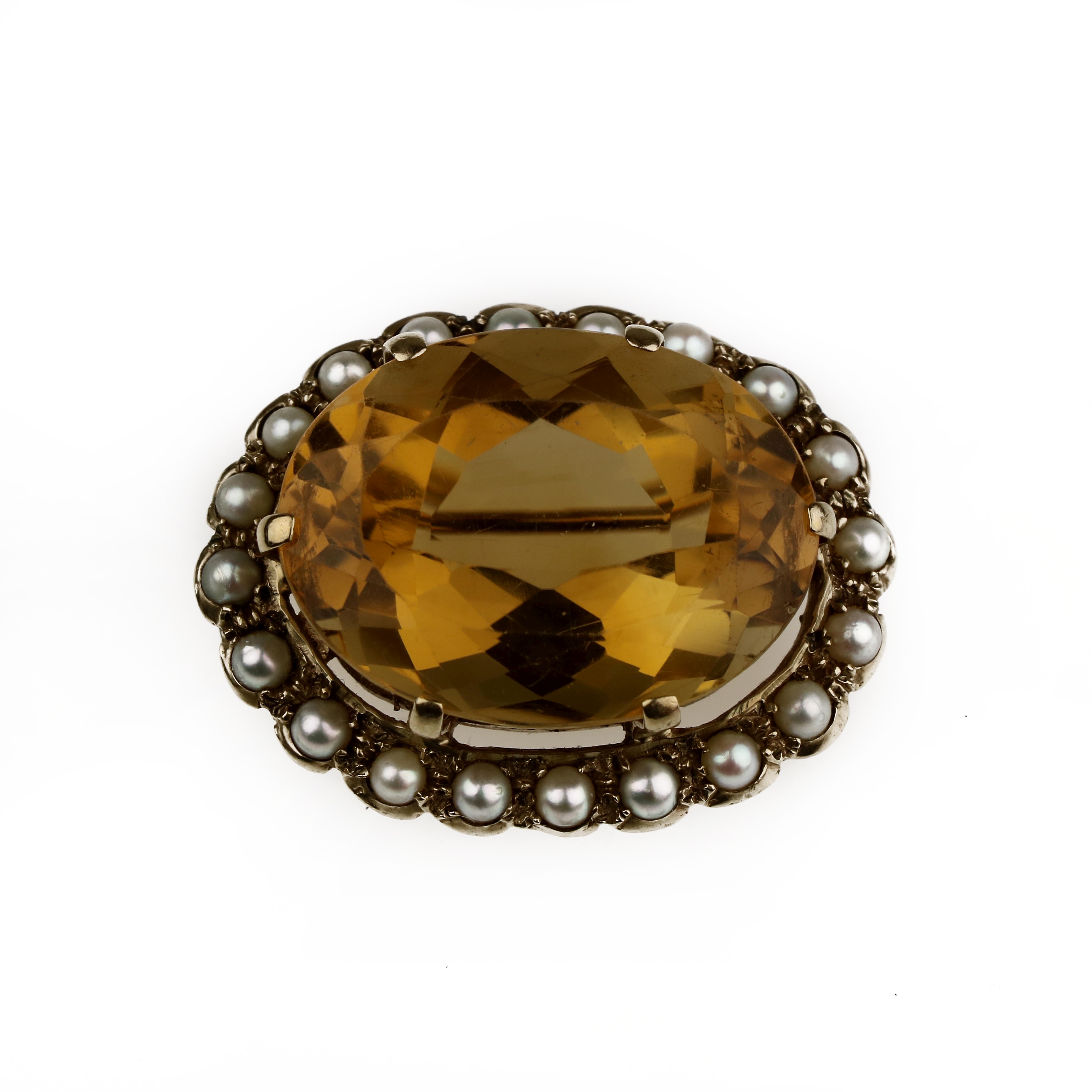 A citrine and seed-pearl brooch