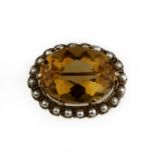 A citrine and seed-pearl brooch