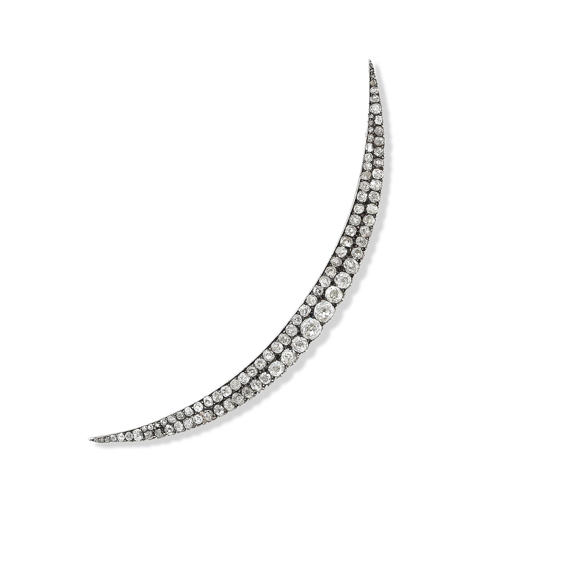 A diamond crescent brooch