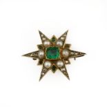 An emerald and seed-pearl star brooch