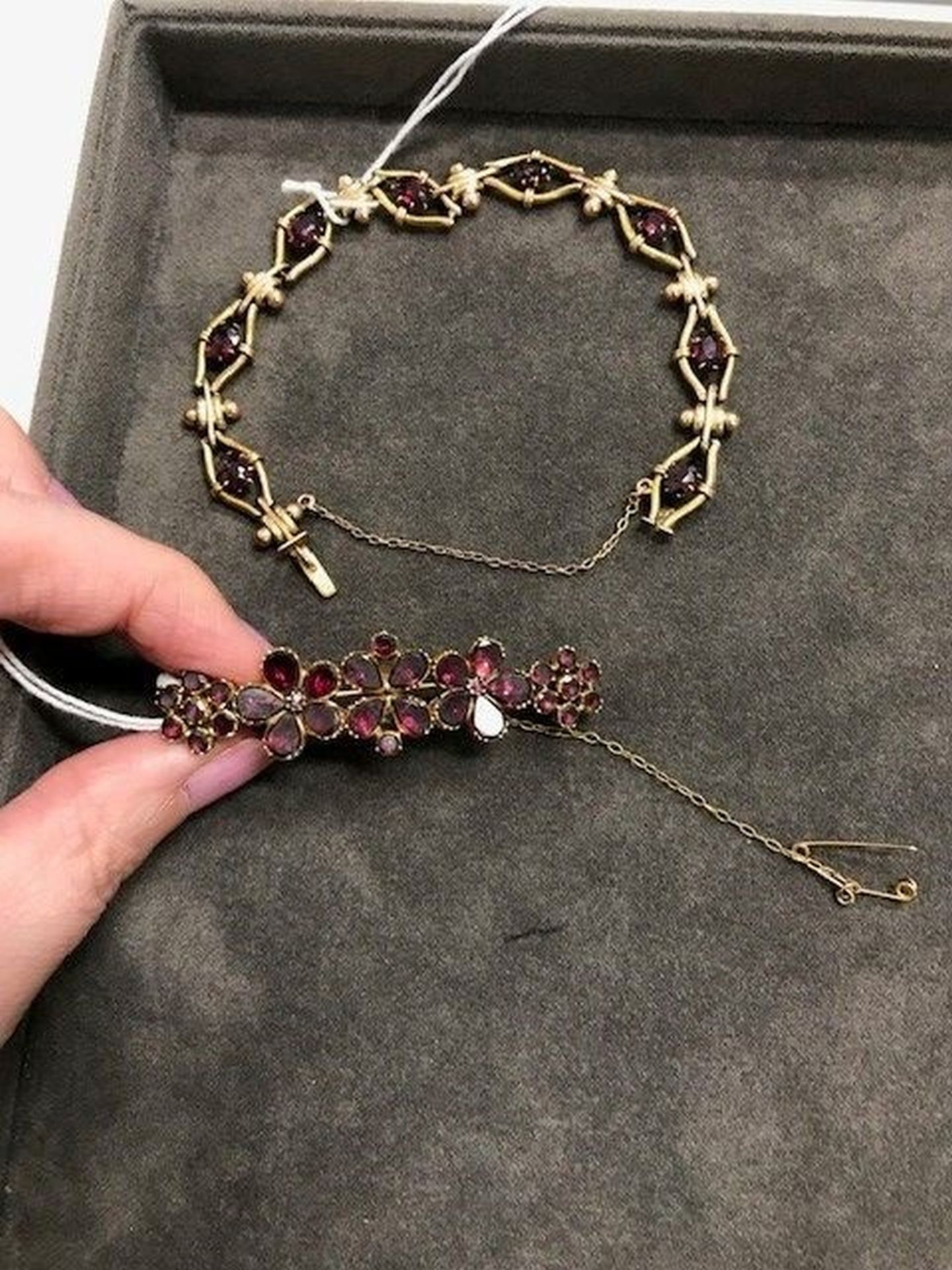 A garnet brooch and bracelet