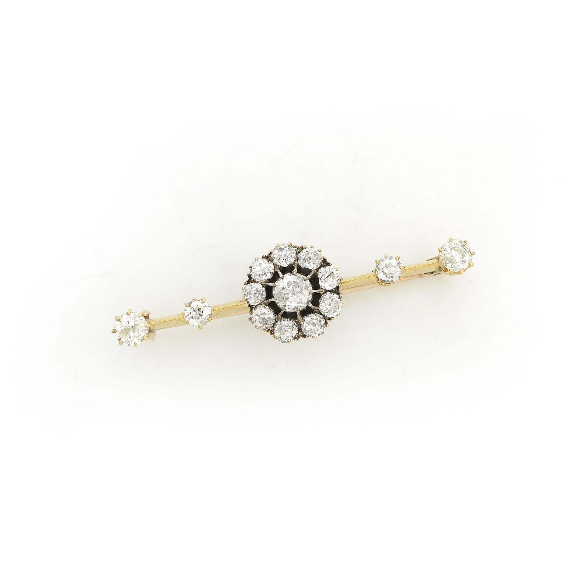 A diamond floral cluster bar brooch