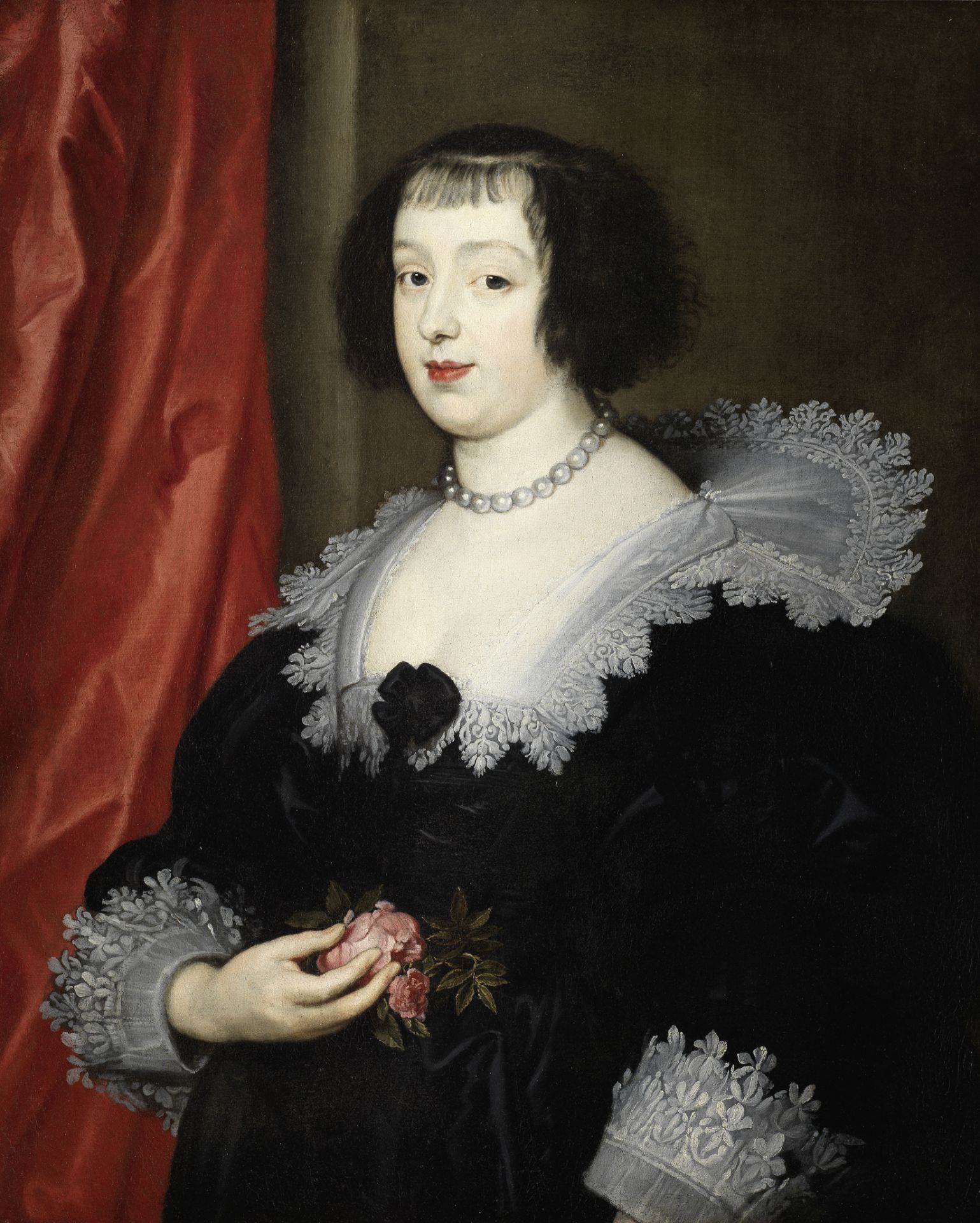 After Sir Anthony van Dyck, 17th Century Portrait of a lady, half-length, in black costume holdin...