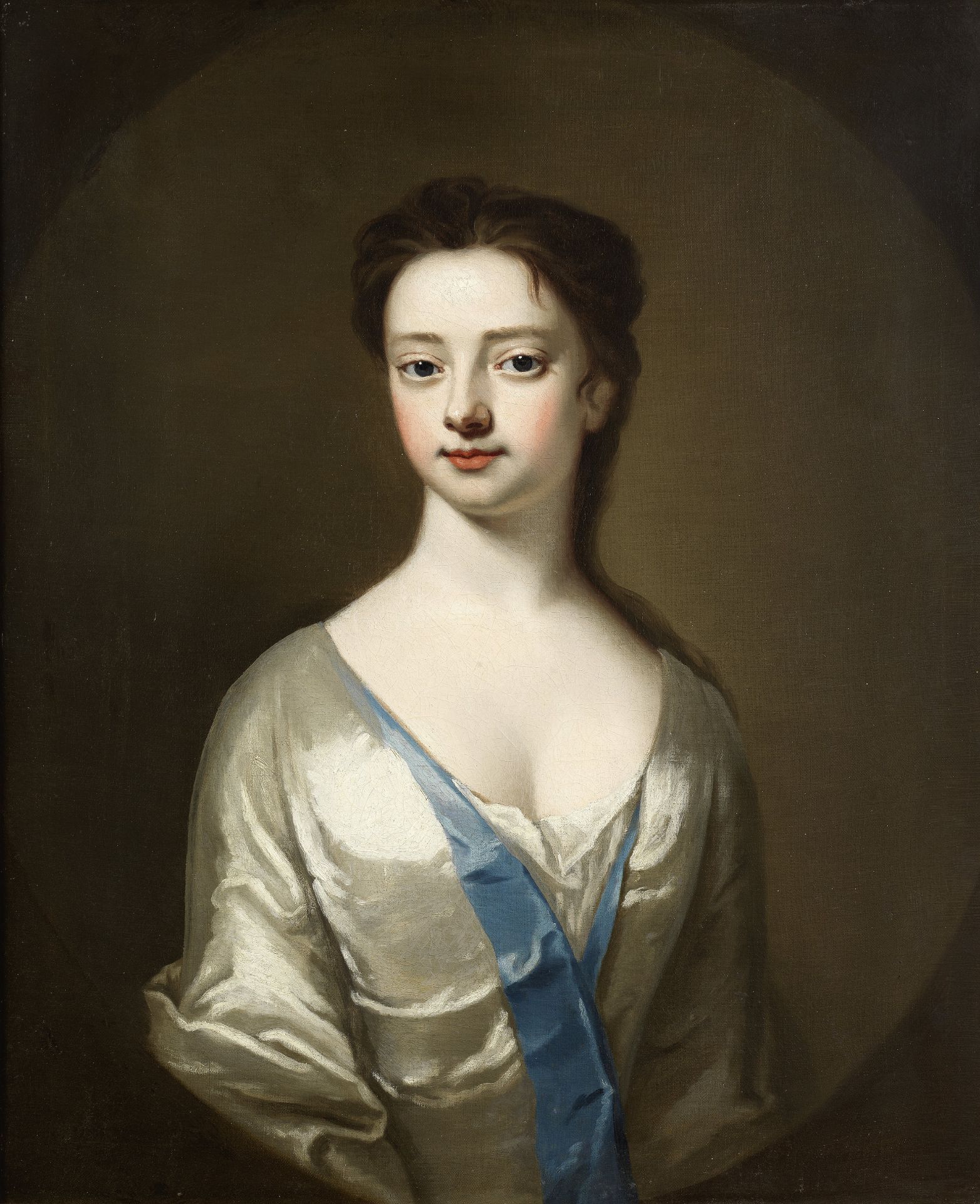 Circle of Michael Dahl (Stockholm 1659-1743 London) Portrait of a lady, half-length, in a white d...