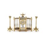 A good late 19th century brass and cloisonné enamel colonnade mantel clock together with a pair o...