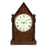 An early 19th century brass-inlaid mahogany table clock Thomas Pace Jr