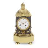 A good and rare early 19th century gilt and patinated bronze mantel clock in the form of a beehiv...