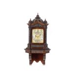 A fine quality late 19th century carved mahogany quarter chiming bracket clock with original brac...