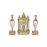 A fine late 19th century brass and cloisonné enamel mantel clock with a pair of associated vases ...